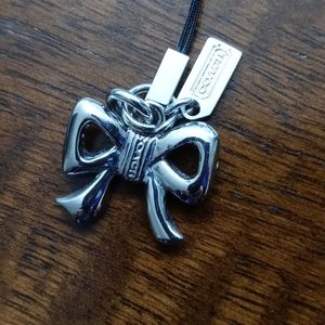 Coach Accessories - Coach silver rhinestone bow cellphone charm Coach Accessories - Coach silver rhinestone bow cellphone charm